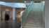 Le scale, mobile e fissa, al I piano dell'ospedale Giovanni Paolo II di Olbia